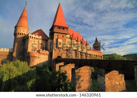 Middle age castle with gothic architecture at sunset, Romania