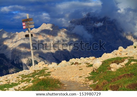 Direction indicator on mountain trail, Dolomite Alps, Italy