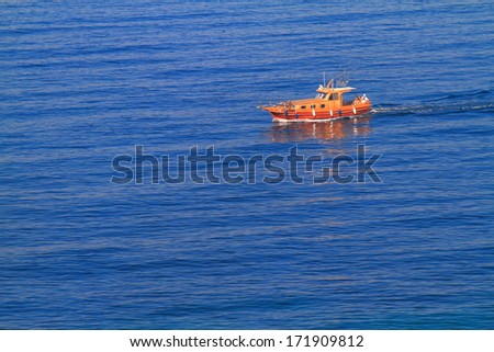 Vintage power boat on the blue Adriatic sea