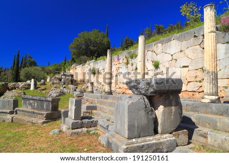 Standing and fallen columns on archeology site from the ancient times, Greece