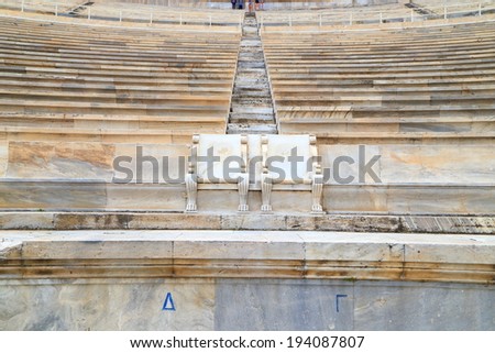 White marble seats of Greek stadium from ancient times in Athens, Greece