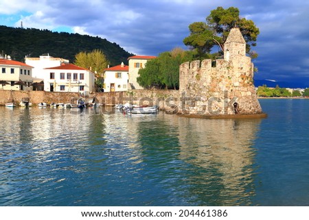 Small boats take cover inside Nefpaktos harbor protected by the Venetian walls, Greece
