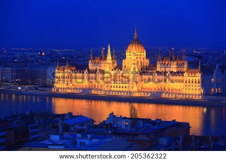 Night falling on the Parliament building reflected by the Danube river, Budapest, Hungary