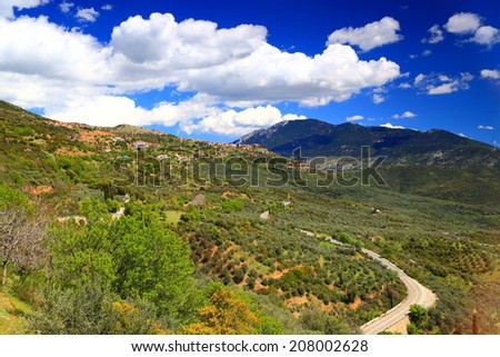 Arachova mountain town located on green slopes near Parnassus Mountains, Greece
