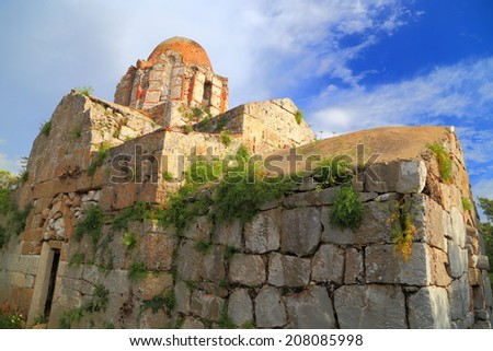 Abandoned old church covered with vegetation, Greece