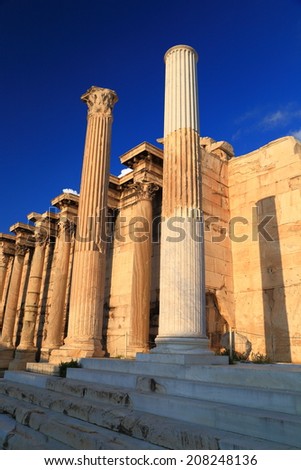 Tall columns and the western wall of the Hadrian Library in Athens, Greece