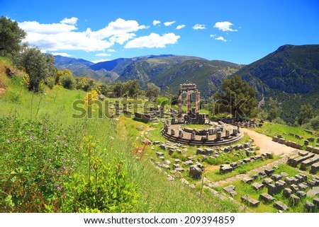 Green valley on the Parnassus Mountains and a temple dedicated to Greek goddess Athena, Delphi, Greece