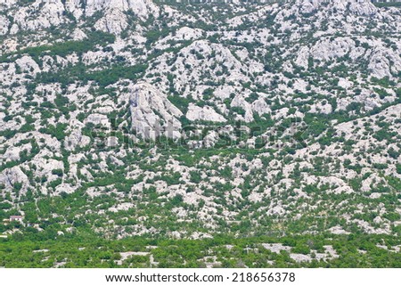 Spotted pattern of limestone mountains on the Dalmatian coast, Croatia