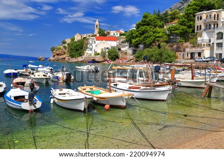 Wooden boats anchored in small harbor on the Dalmatian coast, Croatia