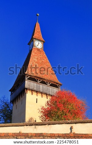 Clock tower of fortified church from UNESCO world heritage list in Biertan village, Transylvania, Romania