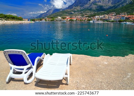 Pair of beach chairs on the Dalmatian coast, Makarska, Croatia