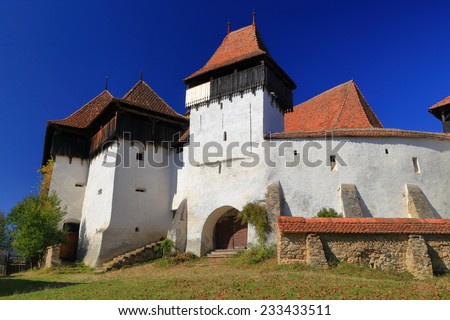 Fortified walls and towers of medieval church from UNESCO world heritage list in Viscri village, Transylvania, Romania