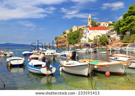 Traditional village with small harbor on the Dalmatian coast, Croatia