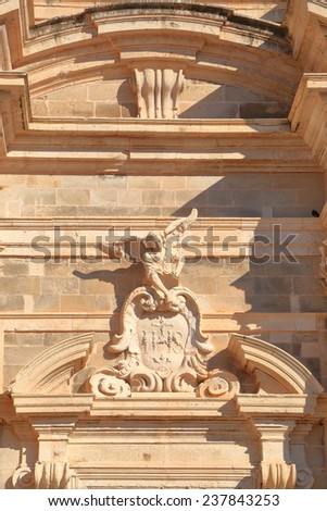 Stone sculpture decorates the baroque facade of St Ignatius Church (Crkva Sv Ignacija) inside old town of Dubrovnik, Croatia