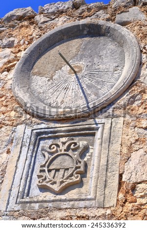 Round dial of a solar clock on a Venetian building from Dalmatian coast, Croatia