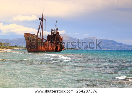 Shallow water and rust covered shipwreck, Gythio, Greece