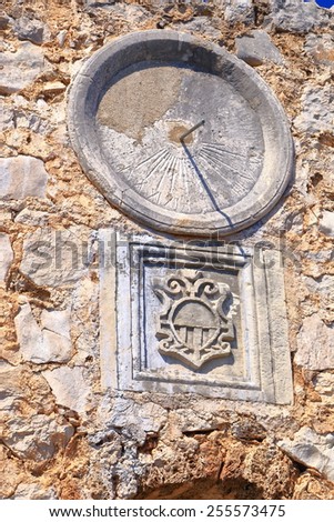 Dial of a solar clock on medieval building wall, Dalmatian coast, Croatia