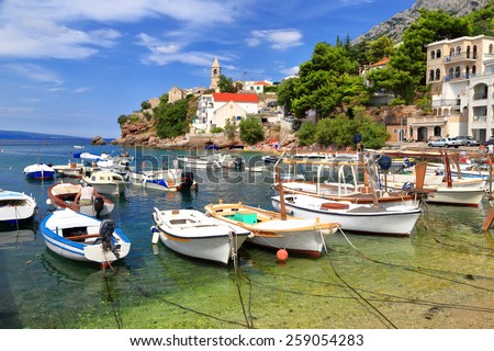 Fishing and leisure boats on the Adriatic sea shore, Dalmatian coast, Croatia