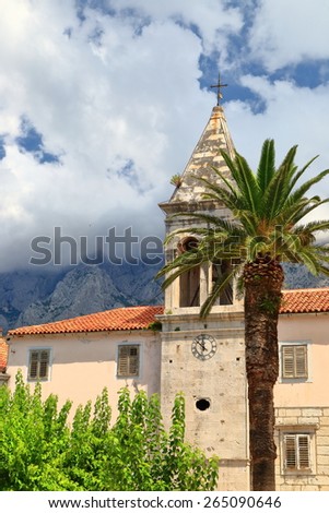 Facade of traditional church inside old town of Makarska, Croatia