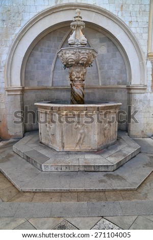 Round arch made of stone above the small fountain of Onofrio, Dubrovnik, Croatia