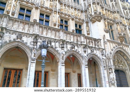 Street lamp and Gothic architecture of the Town Hall building of Brussels, Belgium