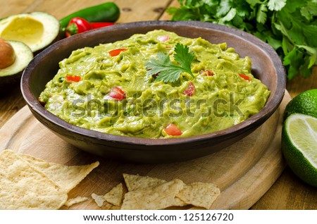 Guacamole With Avocado, Lime, Tomato, And Cilantro With Tortilla Chips.