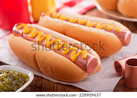 Food humor concept with hot dogs made with copper pipe.