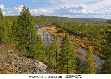 Chulman River in South Yakutia, in the early fall from a height