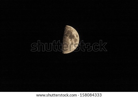 Photo of the growing moon in the night sky