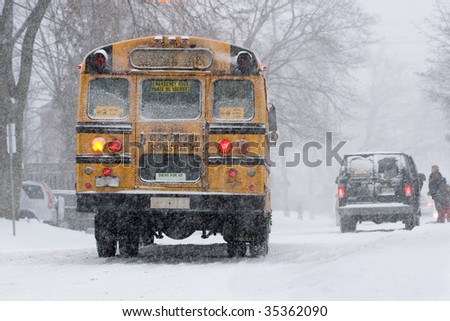 school bus in a snowstorm