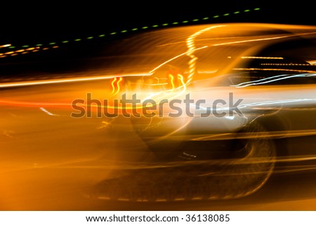 car light streaks on a city street at night