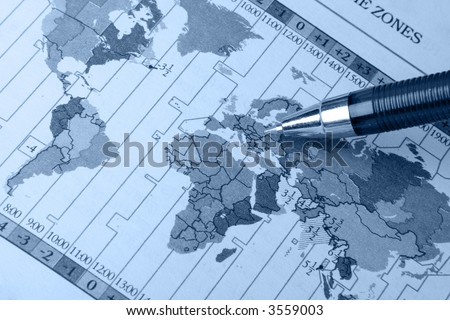 world map and pen in blue