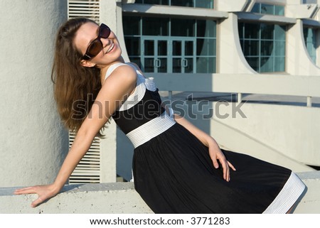 happy beauty sexy girl on business building