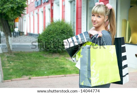 beauty shopping blonde girl with paper bag