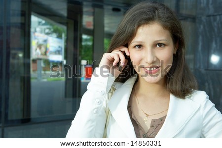 business woman talk to cellphone in the city
