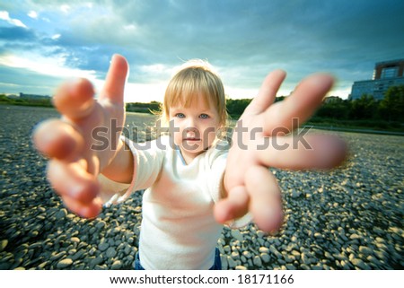 little girl grief look and reach out hands