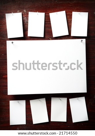 Photo paper attach nail wooden background
