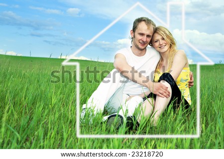 man and woman in house on green field  under blue sky