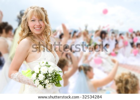 leader bride with groups of bride on people and sky