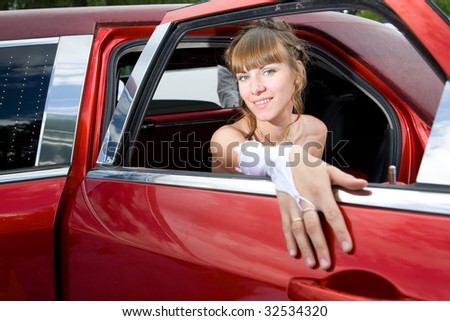 beauty bride woman with limousine outdoor