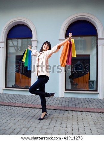 beauty woman with shopping bag outdoor