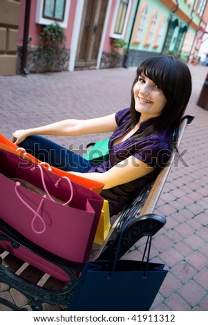 beauty woman with shopping bag outdoor