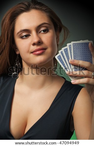 Poker player in casino with cards and chips on green background