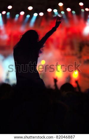 cheering woman crowd at concert