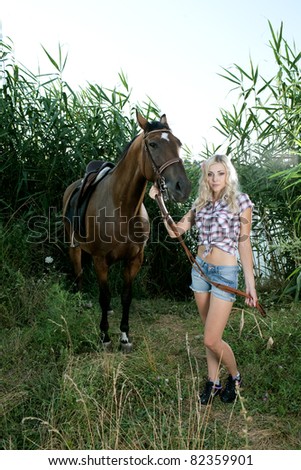 beauty woman with horse in the forest