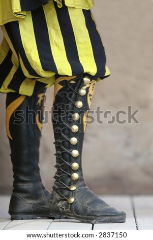 Medieval style high lace up boots
