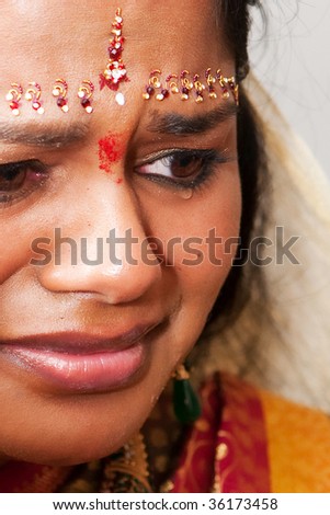 A young Indian bride crying