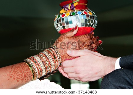 stock photo A bride and groom take part in a Hindu wedding ceremony