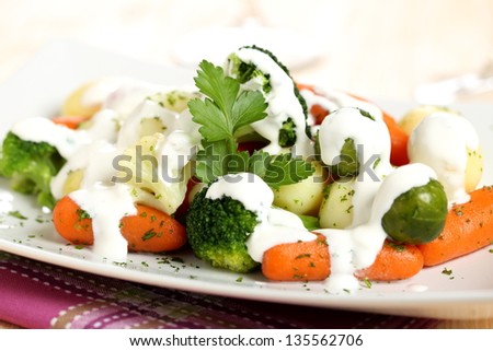 boiled vegetables with white sauce