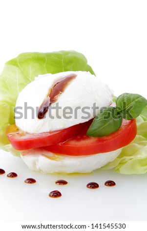 mozzarella cheese and tomato slice on white background